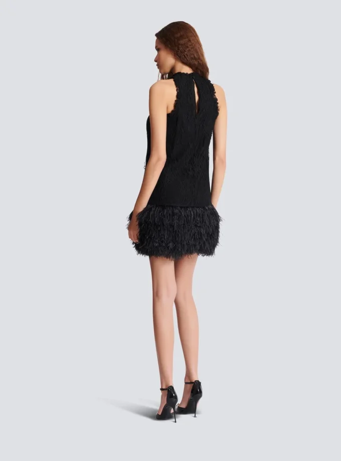 Flowing lace and feather dress