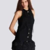 Flowing lace and feather dress