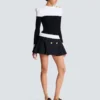 Long-sleeved two-tone knit top