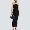 Long sleeveless dress with embellished detail