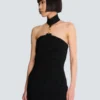Long sleeveless dress with embellished detail