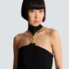 Long sleeveless dress with embellished detail