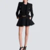 Pleated flared tweed skirt