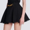 Pleated flared tweed skirt