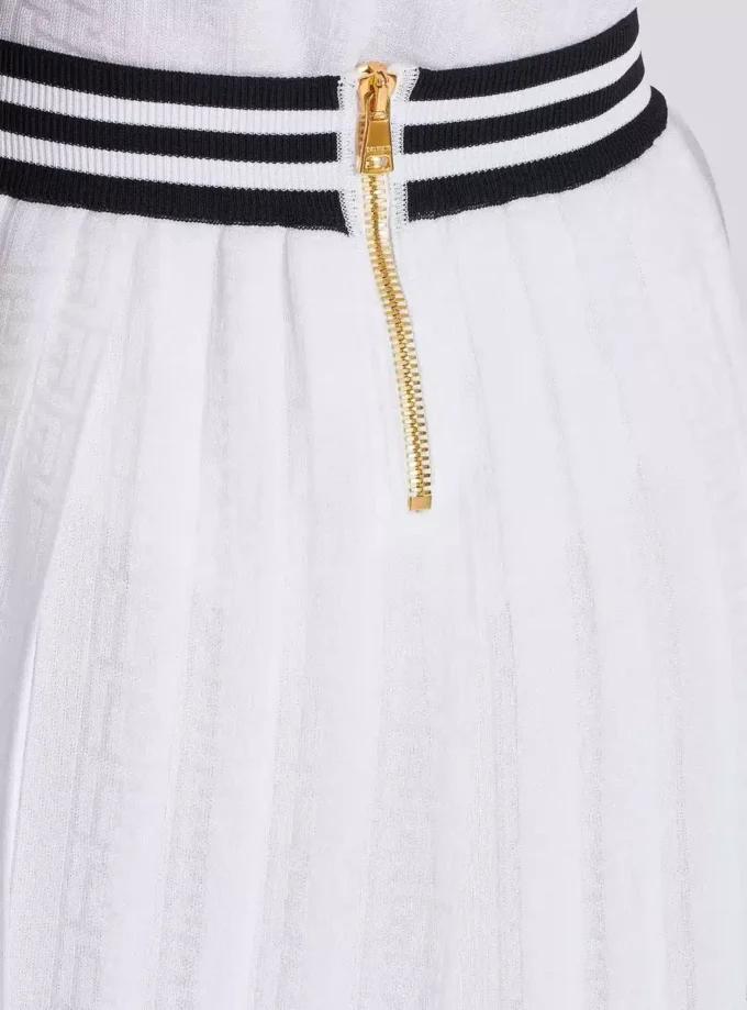 Pleated monogrammed knit skirt