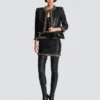 Short lambskin skirt with chains