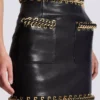 Short lambskin skirt with chains
