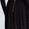 Short pleated skirt in plaid knit