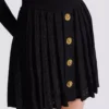 Short pleated skirt in plaid knit