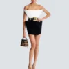 Structured dual fabric strapless dress