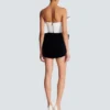 Structured dual fabric strapless dress