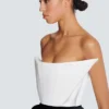 Structured dual fabric strapless dress