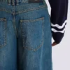 Wide-leg faded denim jeans
