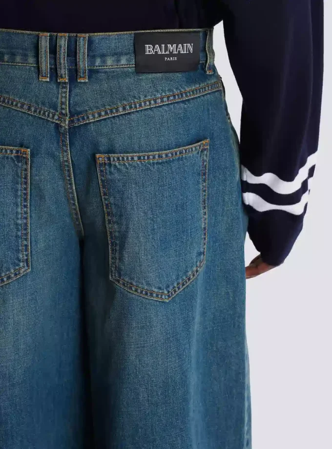 Wide-leg faded denim jeans